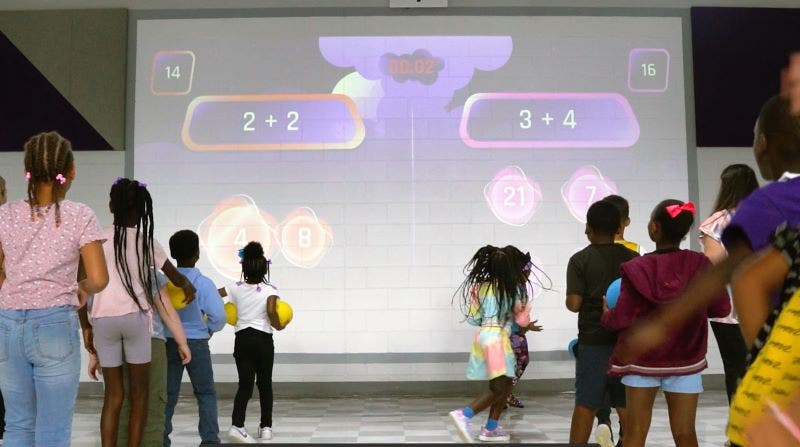 Students learn quick math skills on Lu Interactive's Newton App. 